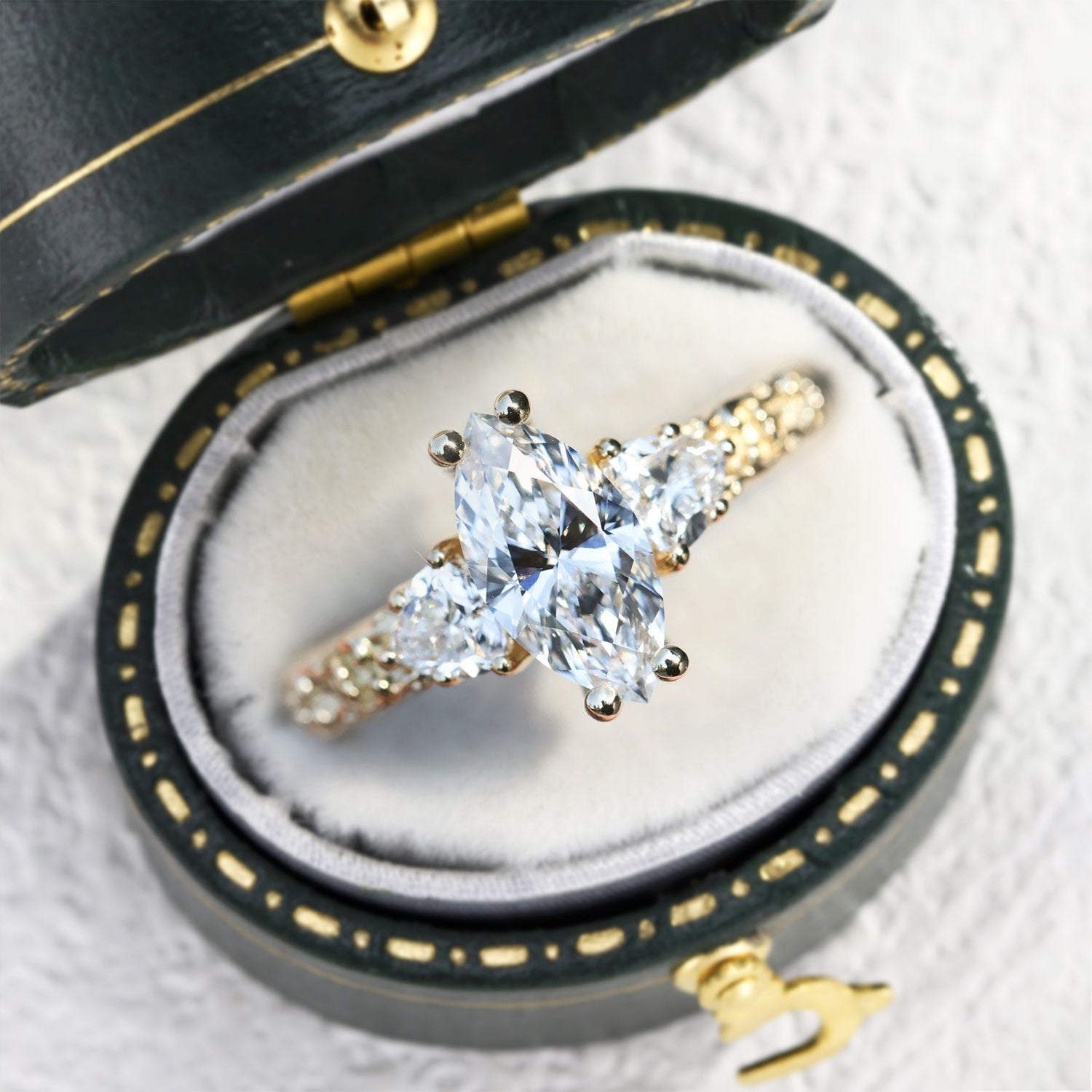 Vintage Marquise Moissanite Engagement Ring with Trillion Side Stones - Orlina Jewelry