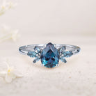 Unique Pear Lab Alexandrite 18K White Gold Engagement Ring with Petal Accents