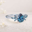 Unique Pear Lab Alexandrite 18K White Gold Engagement Ring with Petal Accents