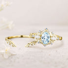 Unique floral engagement rings Oval Lab Aquamarine Flower Engagement Ring Set Delicate Aquamarine Leaf 18K Yellow Gold Wedding Ring Set