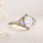 Unique Three Stone Oval Moissanite and Blue Sapphire 18K Yellow Gold Engagement Ring