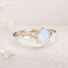 Vintage Oval Lab Opal and Moissanite 18K White Gold Engagement Ring
