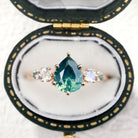 Unique Teal Pear Sapphire and Moissanite 14k yellow gold Engagement Ring